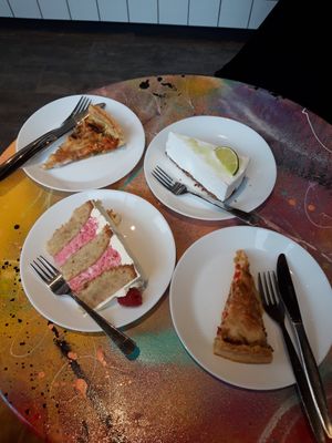 Lemon mousse cake, raspberry cake, smoked carrot quiche and vegan "ham" and bell pepper quiche at Cafe & Bakery Mimosa in Tampere