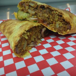 Potatoes and cauliflower in a zesty mango chutney at Veg-In YYC Re-Planted in Calgary