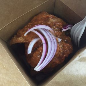 samosa poutine- essentially samosa mashed a bit with yummy sauce at Veg-In YYC Re-Planted in Calgary