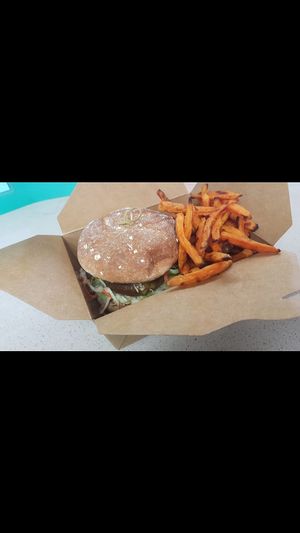 Delicious beyond meat burger with sweet potato fries. at Veg-In YYC Re-Planted in Calgary