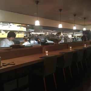 Chefs at work at counter at Ukishima Garden in Kyoto