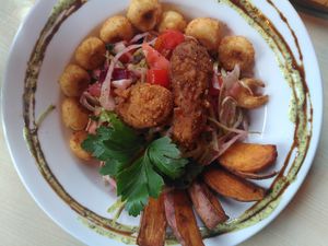The beach salad with palm heart calamari, sweet potato wedges and fried 'chicken' at Voltaire in Bangor