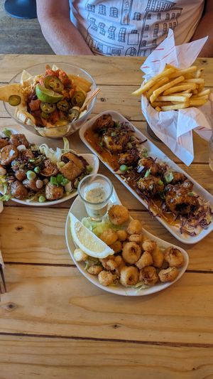 Nachos, teriyaki tofu, calamari and buffalo wings at Voltaire in Bangor