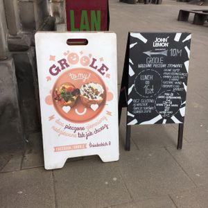 signs outside  at Groole in Warsaw