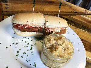 seitan eggplant Parmesan sandwich with mac & cheese at Paisley Vegan Kitchen in Cocoa