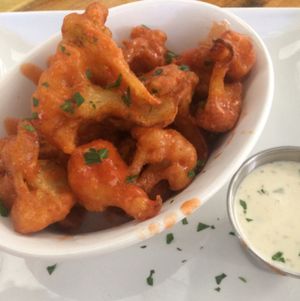 buffalo cauliflower bites at Paisley Vegan Kitchen in Cocoa
