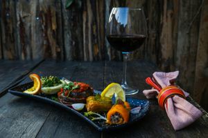 Home made cold plate 
include ; herbed artichoke, quinoa in California pepper, stuffed eggplants, stuffed zucchini blossoms at MASK Ethnic Fun in Antalya