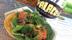 The Paulie - garlic hummus, homemade tomato basil marinara, spinach and sautéed mushrooms. at Falacos - Food Truck in Houston