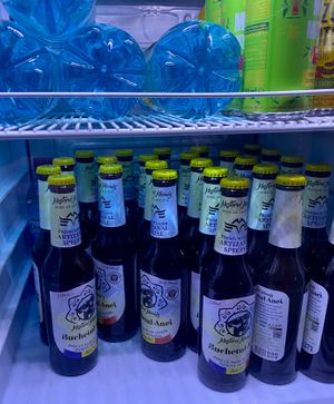 A shelf in the cooler of available beverages. at Miau in Bucharest
