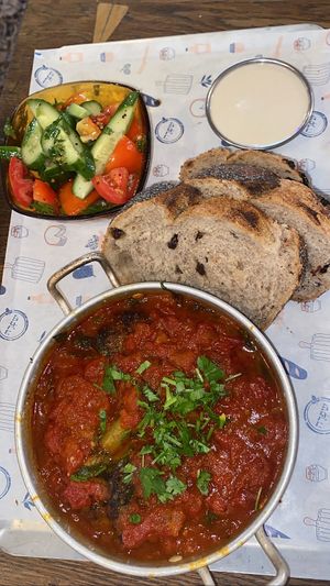 Vegan shakshuka (with veggie patties )  at Puaa Cafe  in Tel Aviv