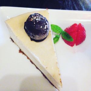 vegan cheesecake with bounty ball and homemade ice cream  at The Old Bell in Henley On Thames