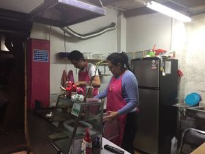 Cooking  at A Darle Que es Taco Vegano - Churubusco in Mexico City