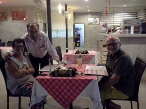 Owner with customers at Shahbaba Indian Restaurant in Phuket