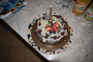 My delicious chocolate cake with "white chocolate" and fruit on top from last year.  at MoMo Veg Cafe  in Prague