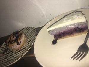 Blueberry donut and bluberry cake at MoMo Veg Cafe  in Prague