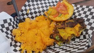 Bacn cheeseburger with cheesy tater tots at Arlo's Food Truck - Spider House Cafe in Austin