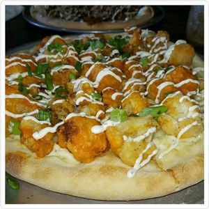 Buffalo cauliflower with vegan ranch drizzle at Mozzarella Fellas in Winston-salem