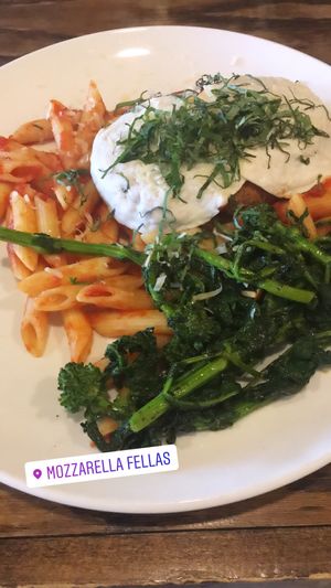 Vegan Chikin Parm with house-made mozzarella cheese, penne, and broccoli rabe  at Mozzarella Fellas in Winston-salem