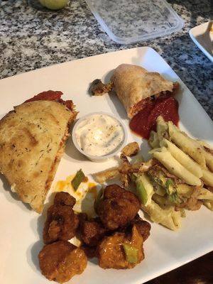  Chicken parm sandwich, mushroom sausage calzone, Demons (buffalo cauliflower wings (came with ranch)), and fire proof (mac n cheese w/ jalapeño and fried onion). Delicious!!  at Mozzarella Fellas in Winston-salem