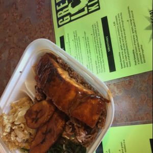 the salmon hot bar with plantains, spinach, gluten-free vegan mac&cheese, and the salmon of the day  at Green Love Kitchen in Lithonia