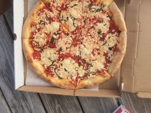 Margarita pizza with vegan cheese  at Mario's Pizza in Ocean City