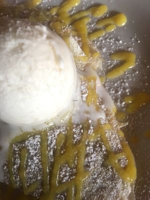 Spiced banana crepes with mango sauce and macadamia cream at Of Roots and Blooms - Pop-up in Portland