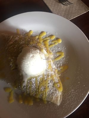 Spiced banana crepes with mango sauce and macadamia cream at Of Roots and Blooms - Pop-up in Portland