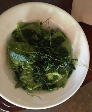 Housemade raviolis with almond ricotta stuffing , savory chips and seasonings  at Of Roots and Blooms - Pop-up in Portland