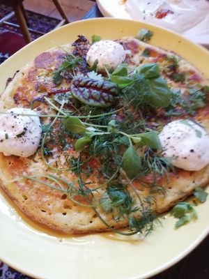 Chickpea pancake with greens and sour cream at WILD in Antwerpen