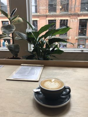 Oat latte while people watching!   at Idle Hands in Manchester