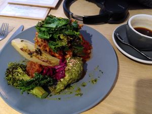 Vegan Fry Up. A stack of hash browns and green. at Idle Hands in Manchester