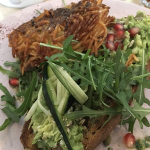 Avo on toast with hash brown on the side at Idle Hands in Manchester