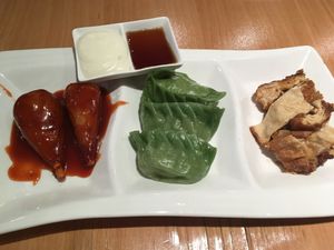 Choose three for $12 - wings, steamed dumplings, soy sheets  at Go Zen in New York City