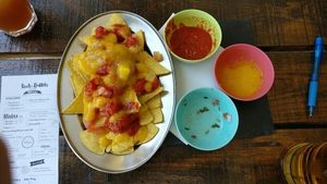 nachos with salsa and mango pineapple sauce  at Beats & Burritos in Lagos