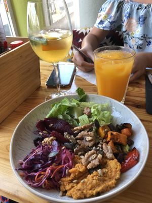 Vegan bowl, white sangria and orange juice at Beats & Burritos in Lagos