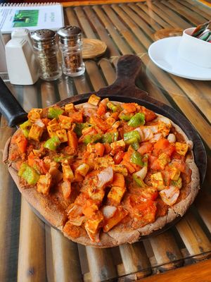 Vegan vegetable tofu Pizza with ragi flour at Pure Soul Cafe in Rishikesh