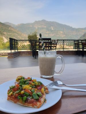 Vegan pizza (not the whole thing, just some slices!) And smoothie at Pure Soul Cafe in Rishikesh