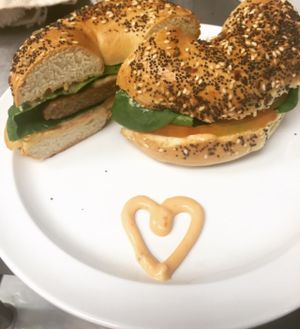 Vegan burger (requested on bagel instead of bun, with vegan burger sauce, spinach, tomato) at Jolly Beans Cafe in Henderson