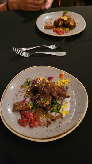 Macintosh apple fritters with rosemary sugar and a candied apple cider glaze. at Harvest Beat in Seattle