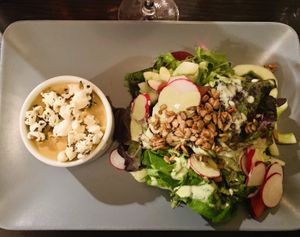 First and second courses plated together  at Harvest Beat in Seattle