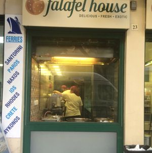 front of shop at Falafel House in Athens