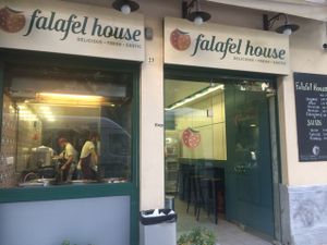 front of shop at Falafel House in Athens