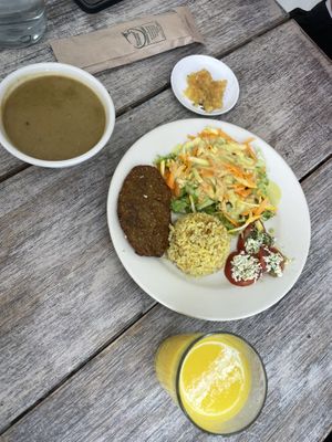 Mushroom soup, mango juice, apple dessert and main dish of the day.   at Veggie Life in Medellin