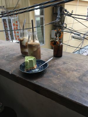Matcha mouse cake and coconut coffee  at La Studio in Hanoi