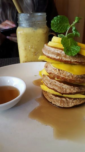 amazing mango pancakes with pineapple jam.  at La Studio in Hanoi