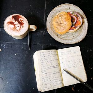 hot coco and lox and cream cheese bagel at La Studio in Hanoi