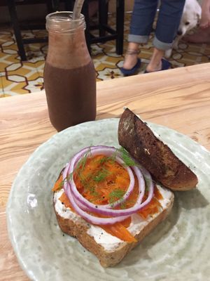 Chocolate smoothie and lox bagel at La Studio in Hanoi