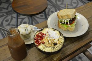 BLT on whole wheat bread (so good!), smoothie bowl, muffin and chocolate or coffee smoothie at La Studio in Hanoi