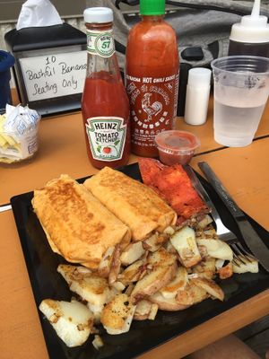 Burrito Duo with grilled tomatoes and home fries at Bashful Banana in Ocean City