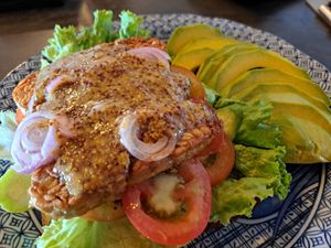 Open Tempeh sandwich with mustard sauce and extra avocado at Simple Things in Kampot